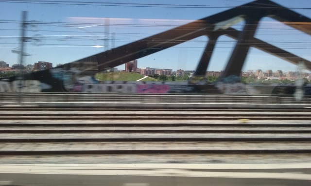 Approaching Madrid. Urban blur at 199 km/h. Photo © snobb.net